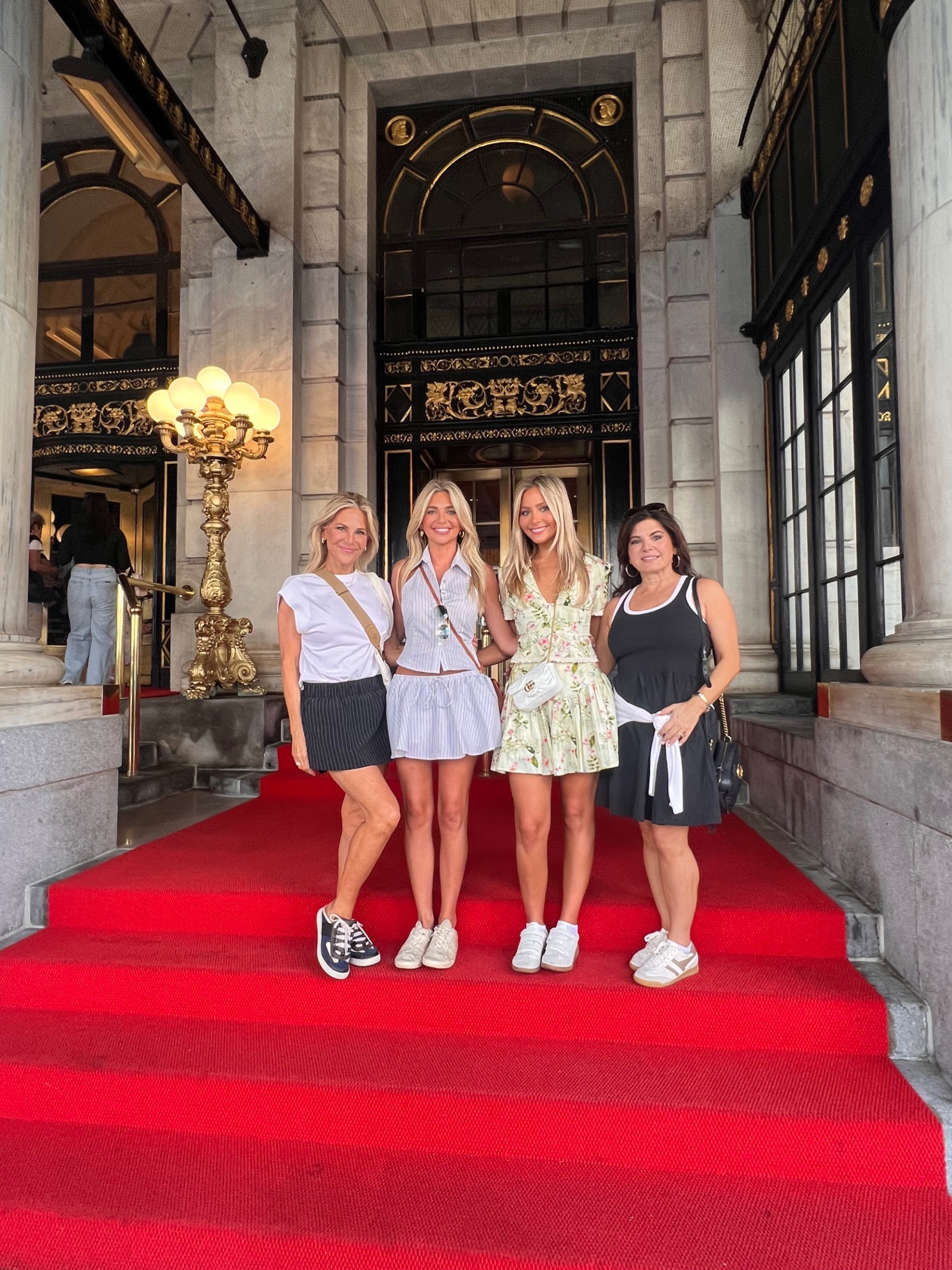 Four guests at the Empire Hotel on a Friendly Gossip Girl Tour in New York City