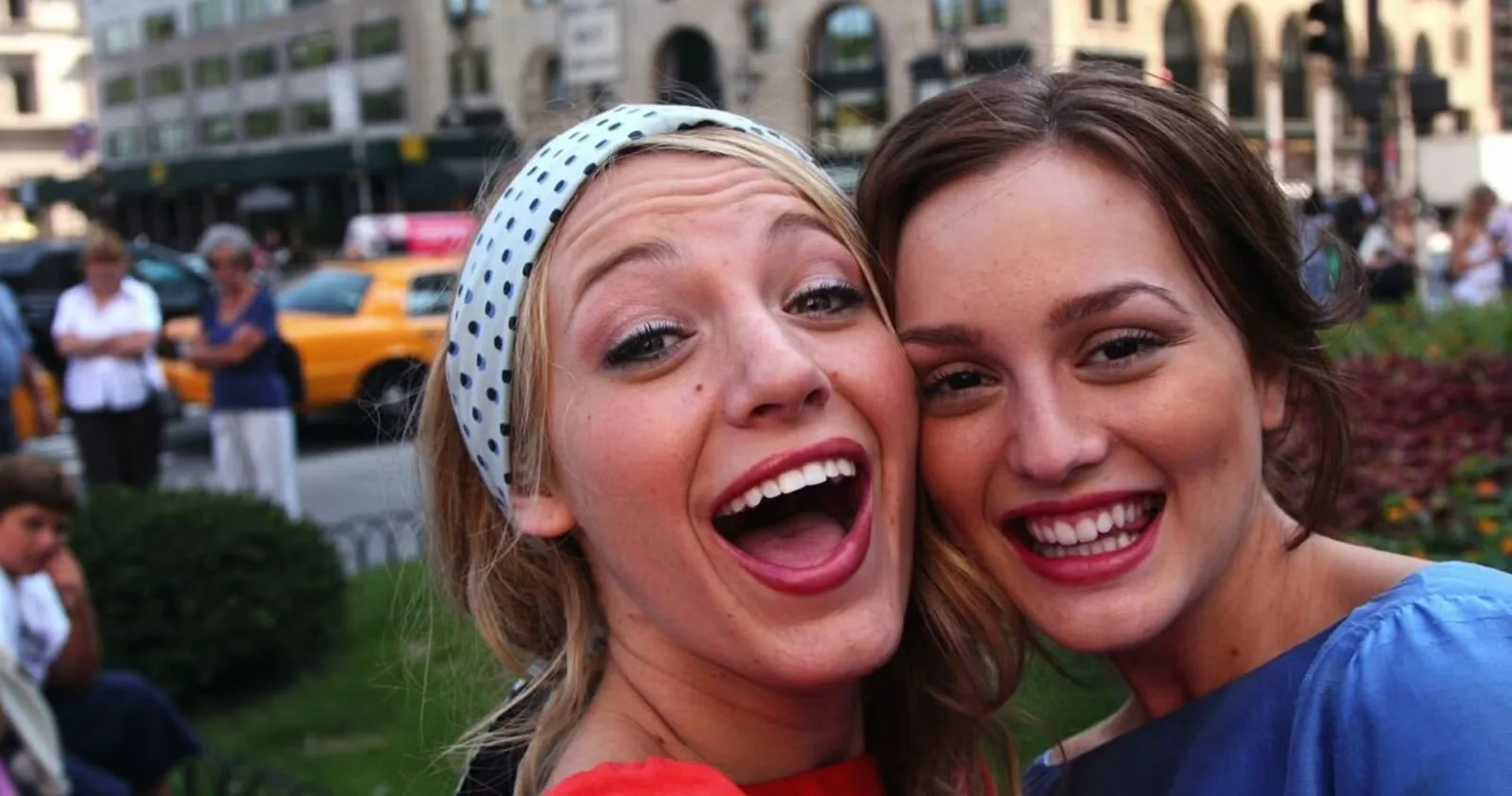 Serena and Blair taking a close-up photo together at Grand Army Plaza during the Gossip Girl photoshoot