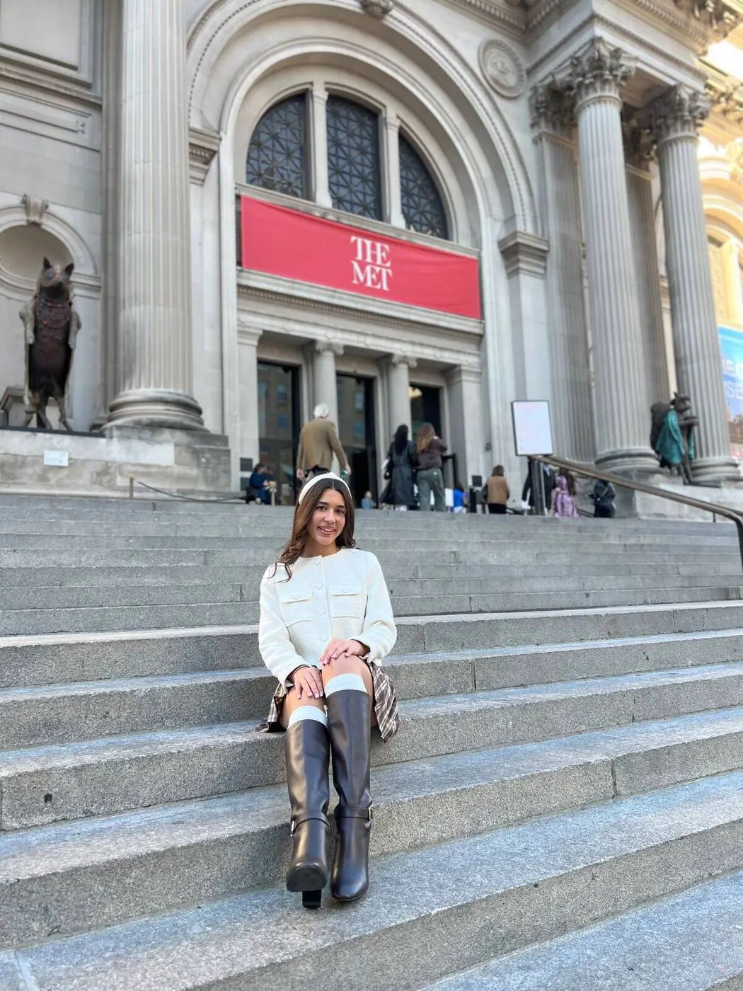 Girl in Blair Waldorf outfit posing on The Met Steps at The Metropolitan Museum of Art