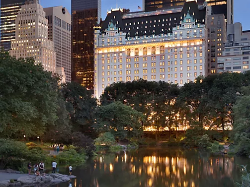 The Plaza Hotel stunning view from Central Park at dusk - Gossip Girl Manhattan skyline landmark