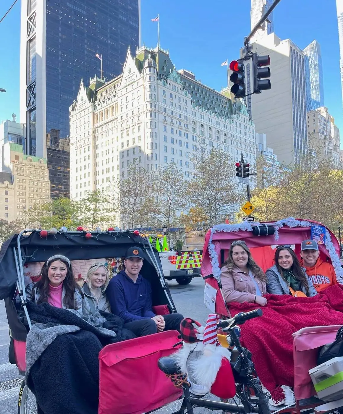 Gossip Girl Tours pedicab group photographed in front of The Plaza Hotel on Fifth Avenue
