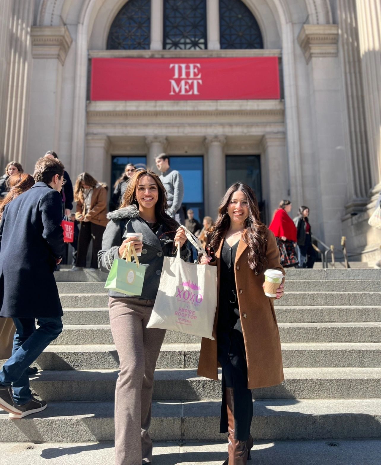 Gossip Girl Tours guide with guests at a famous Gossip Girl filming location in Manhattan