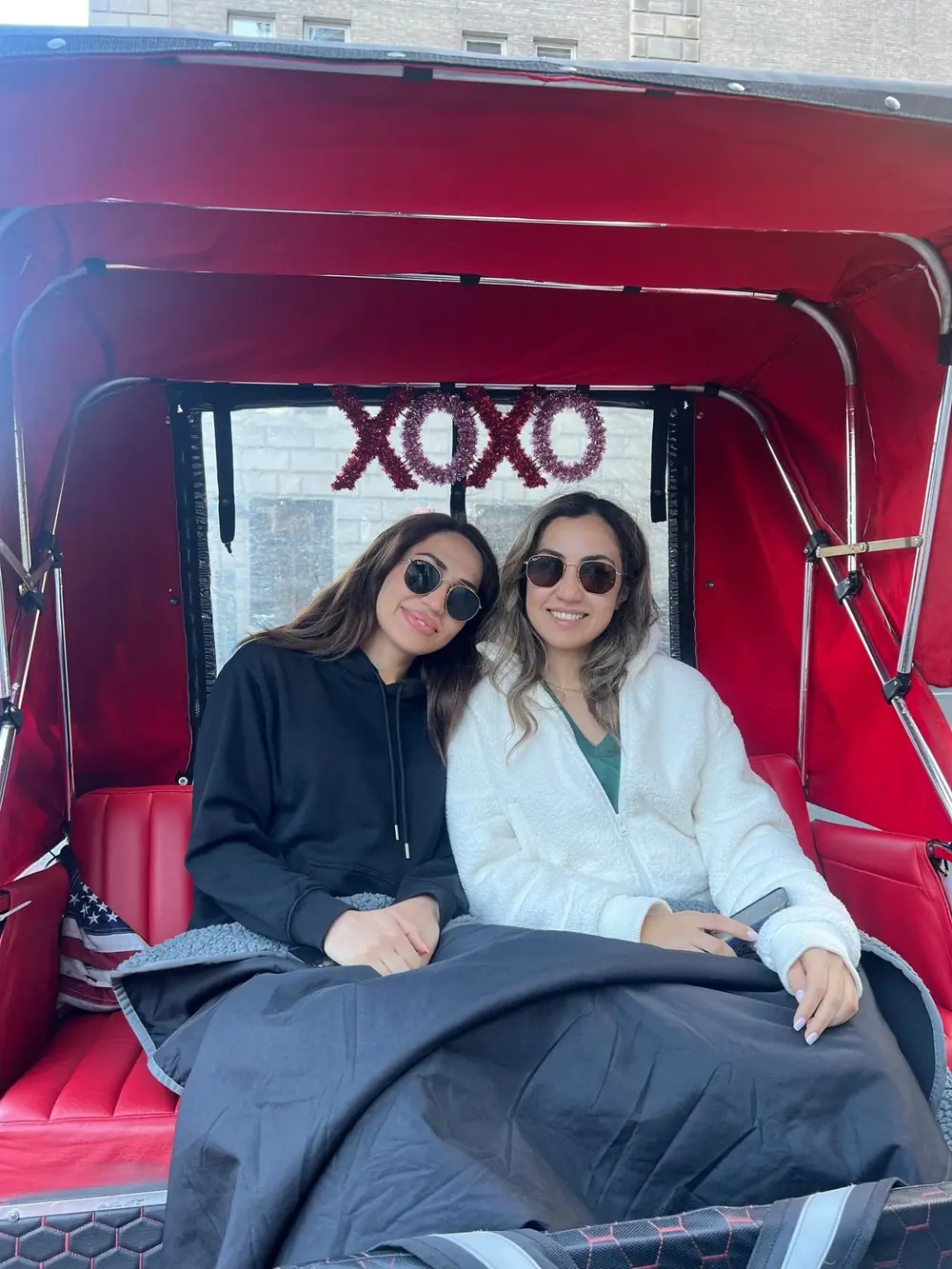 Gossip Girl Tours guests in the XOXO pedicab on the Upper East Side during a Gossip Girl pedicab tour