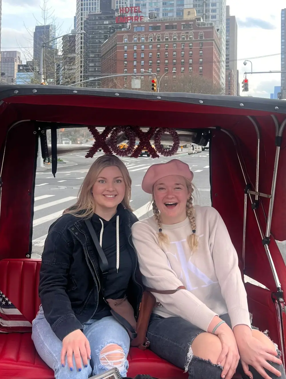 Gossip Girl Tours XOXO pedicab with the Midtown Manhattan skyline behind it on a private pedicab tour
